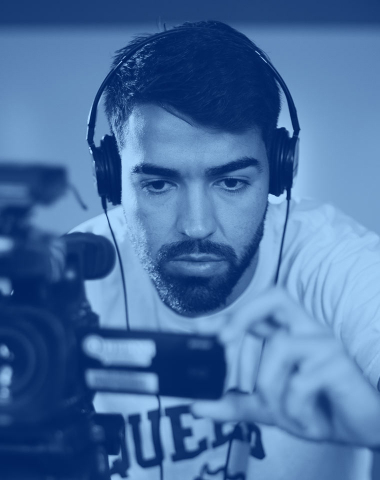 student with video camera